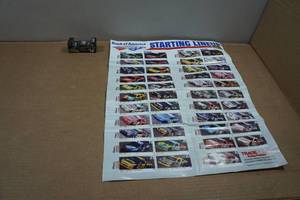 lot 291 image: Bank of America 500 Race Program and Die Cast Car