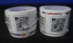 lot 7 image: 2 UNOPENED ROLLS OF FOREVER STAMPS