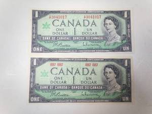 lot 268 image: 2 Canadian Notes 1967 Centennial of Canadian Confederation, 1 with serial #, 1 without