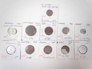 lot 282 image: Saudi Arabia Silver AH 1354 (1935) 1 Riyal plus 10 different vintage world coins
