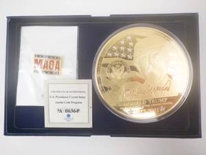 lot 314 image: Donald Trump Jumbo Coin & MAGA Pin - American Mint Crystal Inlay