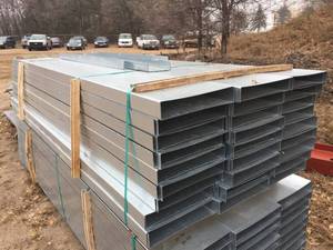 lot 114 image: 56 Pcs 14 x 2 12 x 10 Ft Steel Channel - Top Stack - Appears Unused