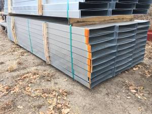 lot 115 image: 56 Pcs 14 x 2 12 x 10 Ft Steel Channel - Bottom Stack  Appears Unused