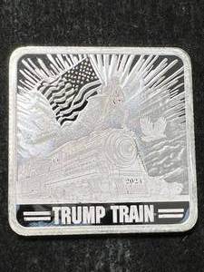 lot 12 image: 1 TROY OZ .999 FINE SILVER TRUMP TRAIN BAR