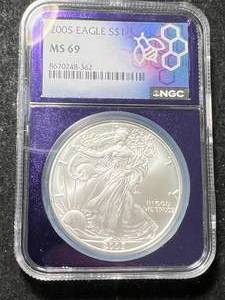 lot 42 image: 2005 AMERICAN SILVER EAGLE NGC MS69