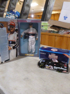 lot 58 image: Dale Earnhardt Figurine and Die-Cast Car