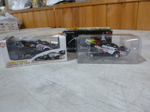 lot 59 image: 2 John Force Driver of the Year Die-Cast Cars