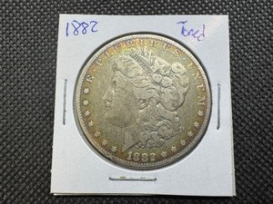 lot 6 image: 1882 Toned Morgan Silver Dollar