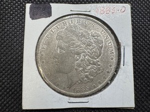 lot 10 image: 1885 O Morgan Silver Dollar
