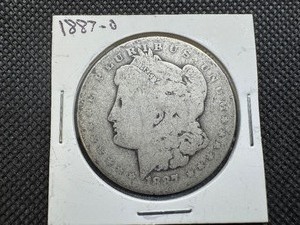 lot 13 image: 1887-O Morgan Silver Dollar