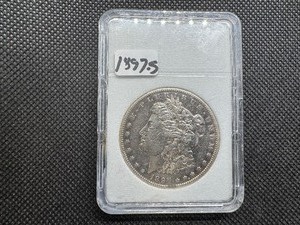 lot 21 image: 1897 S Morgan Silver Dollar