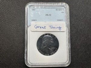 lot 28 image: 1957 Franklin Half Dollar NNC PR70 Great Toning