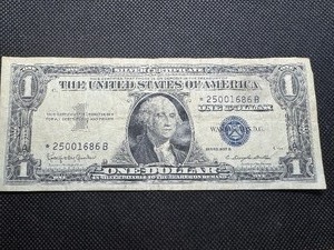 lot 48 image: 1957 B Star Note Silver Certificate