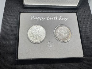 lot 59 image: Happy Birthday Bundle - Two 1 oz Silver Rounds 1998 Eagle and 1996 Birthday Round