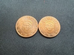 lot 79 image: Two 1 OZ Copper Rounds 2011 Statue of Liberty Design