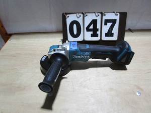 lot 47 image: Makita Cordless Paddle X-Lock Angle grinder - tool only