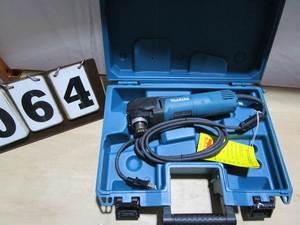 lot 64 image: Makita Corded Multi Tool