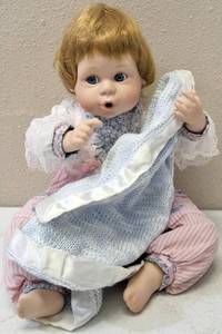 lot 73 image: Danbury Mint - Vintage Amy Thumb Sucking Porcelain Doll with Blanket - 9 Sitting