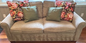 lot 61N image: SR - Grey Upholstered Couch with Floral and Green Throw Pillows