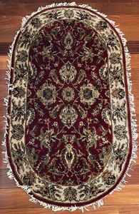 lot 64N image: SR - Oval Area Rug with Fringe, Red and Cream Pattern