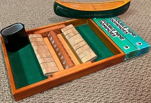 lot 111N image: LL- Game Collection L.L. Bean Cribbage Canoe, Dominoes, and Shut the Box Set