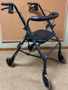 lot 48H image: LL - Nova Cruiser DeLuxe Junior Walker with Seat and Hand Brakes