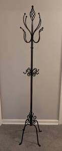 lot 30 image: LR - Decorative Wrought Iron Standing Coat Rack with Decorative Scrollwork