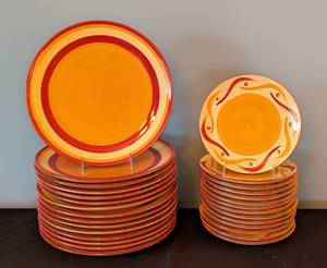 lot 93 image: K - Gail Pittman Dinnerware Set - 15 Dinner Plates and 14 Salad Plates