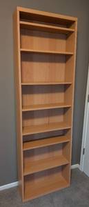 lot 100 image: UL - IKEA Tall 7-Shelf Bookshelf