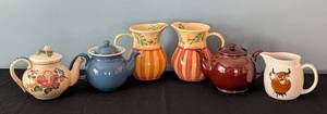 lot 185 image: LR - Assorted Pitchers and Teapots Collection - Gail Pittman, Arabia, Hoganas, More