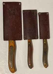 lot 20H image: K - Set of 3 Vintage New West KnifeWorks Knives with Leather Sheaths
