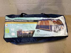 lot 453 image: Magellan Outdoors Grand Ponderosa 12 Person Family Cabin Tent