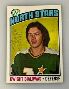 lot 104 image: 1976 Topps Autographed (DWIGHT BIALOWAS) NORTH STARS Trading Card (In Protective Sleeve)