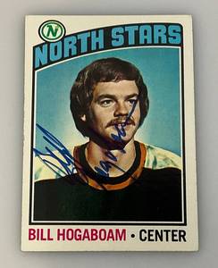 lot 109 image: 1976 Topps Autographed (BILL HOGABOAM) NORTH STARS Trading Card (In Protective Sleeve)