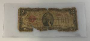 lot 111 image: 1928 D 2 Dollar Jefferson Red Note (In Protective Sleeve) Rough Condition