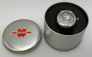 lot 151 image: Vintage WURTH Mens Watch Black And Silver In Original Tin Container (New Old Stock)