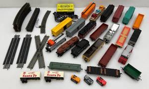 lot 167 image: Misc. Vintage TYCO HO Train Cars, Engine, Track And More