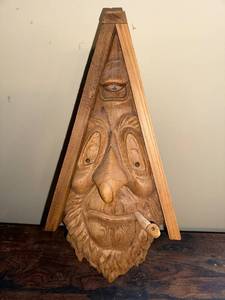 lot 22J image: Hand-Carved Wooden Birdhouse Art with Whimsical Spirit Face and Pipe