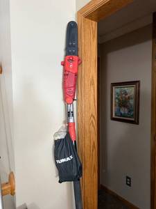 lot 57J image: Sun Joe SWJ802E-RED Electric Pole Chain Saw with Tumax Bag