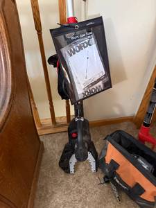 lot 58J image: Worx JawSaw Cordless Electric Chainsaw with Extension and Accessories