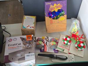 lot 222 image: Lot of  Cat Toys - Erraticat Interactive, Chicken Lighted, Balls, Yarn, Brush (in original packaging)