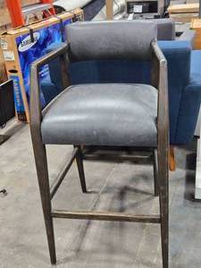 lot 75 image: 40 Bar Chair - Tyler Chaps Ebony by Four Hands