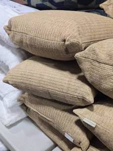 lot 147 image: Lot of (4) 15 Burlap Style Textured Throw Pillows by Pottry Barn
