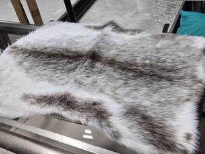 lot 89 image: Faux Fur Throw Rug 3 x 2 by Ikea BULLERSKYDD