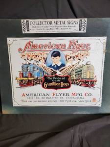 lot 37 image: Collector Metal Signs - American Flyer & Lionel Train Advertisements