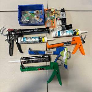 lot 117 image: Caulking items and Glue