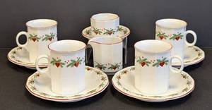 lot 15 image: Set of 4 Porsgrund Hearts and Pines Mug and Saucer Sets