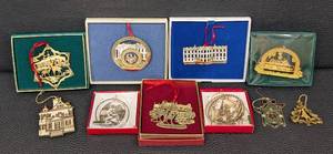 lot 63 image: Collection of 11 Assorted Gold Tone Ornaments with Historic and Holiday Themes