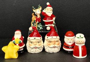lot 48H image: Vintage Christmas Salt and Pepper Shaker Lot including Santa, Mrs. Claus, Deer, and Star