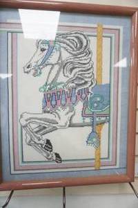 lot 136 image: Framed Cross Stitch Carousel Horse. With Glass
